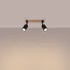 A ceiling light fixture with two adjustable spotlights mounted on a wooden bar. Podgląd zdjęcia produktu