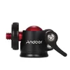 A close-up studio shot of a black and red mini ball head tripod mount. Náhled obrázku produktu