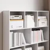 A white bookshelf with various items on its shelves. Podgląd zdjęcia produktu