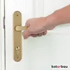 A hand is shown gripping a gold door handle on a white door. Produktbild-Vorschau