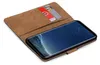 A book-style phone case with two cards inserted, showing a smartphone screen. Náhľad obrázku produktu