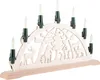 A wooden Christmas arch with electric candles and a winter scene carved into it. Produktbild-Vorschau