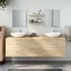 A modern bathroom vanity set with two sinks and ample drawer space, set against a plain wall. Voir les images du produit