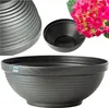 A collage of a planter pot and a hydrangea flower. Produktbild-Vorschau