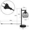 A diagram showing the dimensions of a black metal table lamp with a wire cage shade. Podgląd zdjęcia produktu