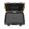 An open black and yellow tool case with foam padding inside. Produktbild-Vorschau