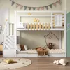 A children's bunk bed in a bedroom with playful decorations. Produktbild-Vorschau