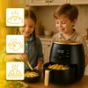 Two children are in a kitchen, with one child holding a french fry and looking at an air fryer. Produktbild-Vorschau