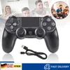 A black wireless controller is shown in the foreground, with a group of people playing video games in the background. Náhled obrázku produktu