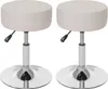 Two adjustable stools with cream-colored seats and silver bases are shown against a white background. Náhled obrázku produktu