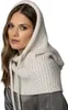 A woman wearing a hooded scarf. Produktbild-Vorschau