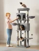 A woman is interacting with a multi-level cat tree that has several cats on it. Produktbild-Vorschau