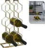 A golden metal wine rack with three green wine bottles. Produktbild-Vorschau
