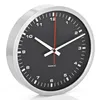 A close-up, angled view of a black wall clock with a silver frame. Anteprima dell’immagine prodotto