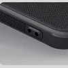 A close-up view of the side of a black phone case, showing textured grip and a button cutout. Produktbild-Vorschau