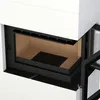 A close-up view of the interior of a modern white fireplace with a black grate and tan firebricks. Produktbild-Vorschau