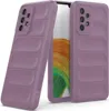 Two phone cases are shown in a diagonal arrangement against a white background. The phone case on the left is angled to show its side and back, while the phone case on the right is shown from the back, with a phone partially visible inside. Produktbild-Vorschau