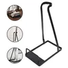 A black metal stand for storing cleaning tools like vacuum cleaners and mops. Produktbild-Vorschau
