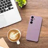 A flat lay of a laptop, a cup of coffee with latte art, and a purple smartphone case on a wooden surface. Produktbild-Vorschau