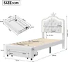 Diagrams and measurements of a bed frame, including a pull-out drawer. Voir les images du produit