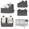 A collage of different views and uses of a gray baby organizer. Produktbild-Vorschau