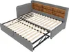 A grey upholstered bed frame with its pull-out trundle bed extended, revealing wooden slats for both. Anteprima dell’immagine prodotto