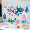 A close-up of an open advent calendar with Stitch and Angel figurines. Produktbild-Vorschau