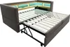 A gray sectional sofa bed with its mattress extended, revealing the wooden slats and metal frame. Náhled obrázku produktu