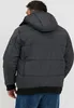 A man is shown from the back wearing a gray winter jacket and blue jeans. Produktbild-Vorschau