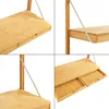 Collage of close-up shots of a wooden wall-mounted desk. Voir les images du produit