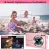 A pink digital camera is shown next to a collage of images demonstrating its zoom and fill light features, featuring a child on a beach and a family indoors. Produktbild-Vorschau