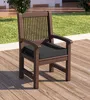An outdoor chair with a cushion on a wooden deck. Produktbild-Vorschau