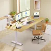 A modern home office setup with a standing desk, multiple monitors, laptops, and a comfortable chair. Produktbild-Vorschau