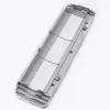 A close-up, overhead view of a gray plastic robot vacuum cleaner brush cover against a white background. Produktbild-Vorschau