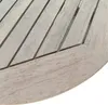 A close-up view of the wooden slats of a round table. Produktbild-Vorschau