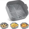 A collage of a gray silicone air fryer liner and three smaller images showing the liner filled with pastries, french fries, and chicken wings. Anteprima dell’immagine prodotto