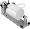A white mug is mounted on a silver rotary attachment for a laser engraver. Náhled obrázku produktu