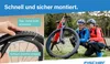 Two people are shown with a bicycle, with an inset showing a close-up of a bicycle tire being fitted. Produktbild-Vorschau