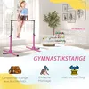 A young girl is using a pink gymnastics bar indoors, with decorative elements and text overlays. Produktbild-Vorschau
