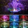 A collage of images showing a solar-powered fountain with LED lights in various colors, set in a garden environment. Produktbild-Vorschau