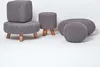 A collection of knitted poufs and ottomans in various shapes and sizes, displayed on a white background. Náhled obrázku produktu