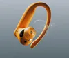 A single orange earbud with a hook for the ear, floating against a gray background with abstract sound waves. Náhled obrázku produktu