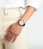 A person wearing a watch on their wrist. Produktbild-Vorschau