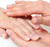 A close-up shot of hands receiving a hand massage. Produktbild-Vorschau