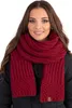 A woman wearing a red scarf. Voir les images du produit
