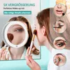 A woman applying makeup using a magnifying mirror, with close-up shots of makeup application techniques. Produktbild-Vorschau
