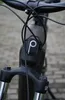 Close-up of the handlebars and front fork of an electric bicycle. Produktbild-Vorschau