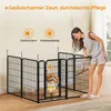 A woman is interacting with a dog inside a black metal playpen. Produktbild-Vorschau