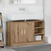A bathroom vanity with a sink and cabinet. Náhled obrázku produktu