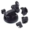 A black GoPro suction cup camera mount and several adapter pieces are displayed against a white background. Náhľad obrázku produktu
